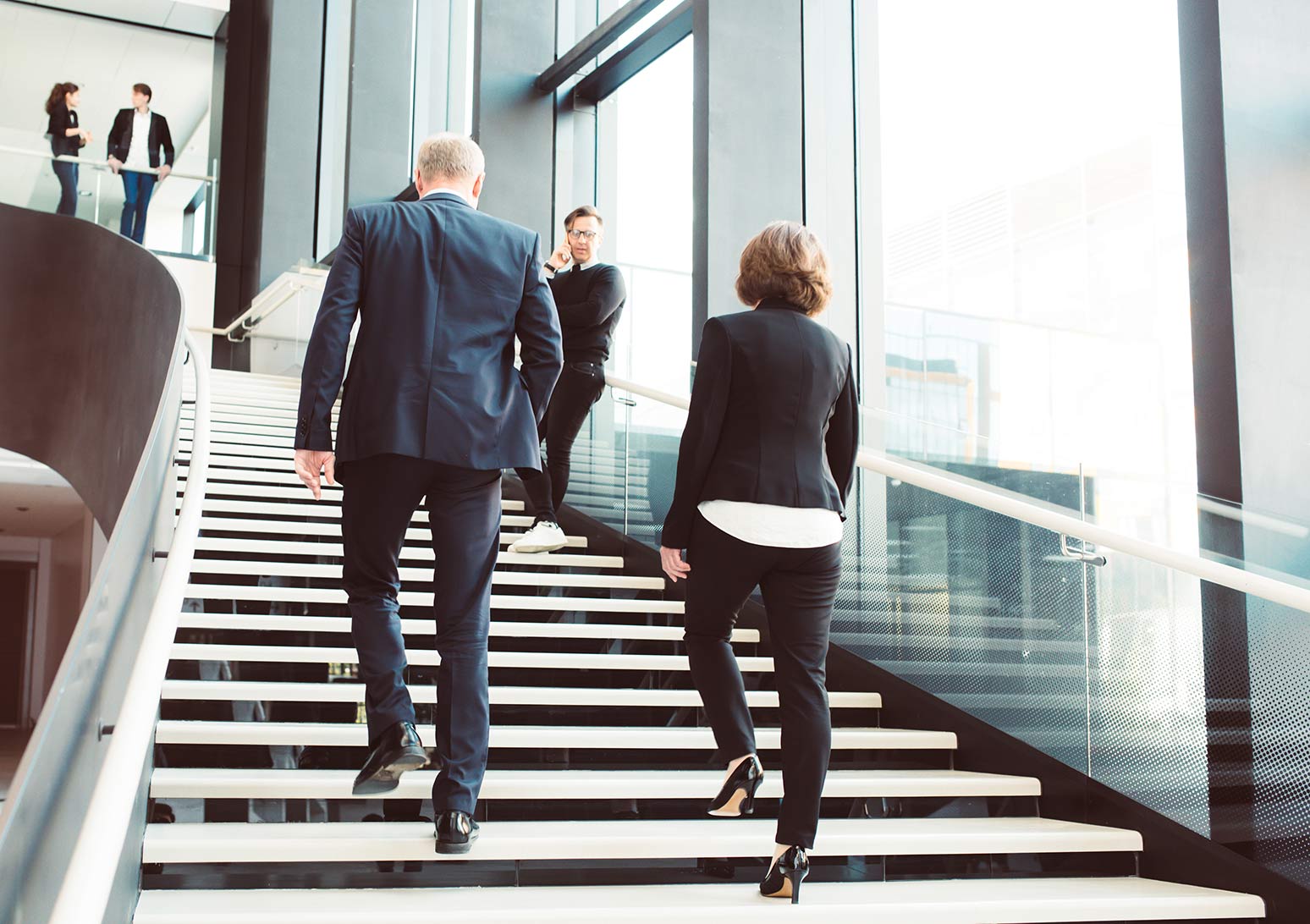 people_walking_stairs_office